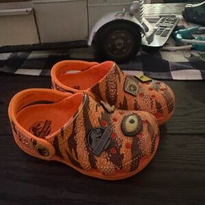 Boys size 6 Limited Edition Jurassic Park toddler crocs.